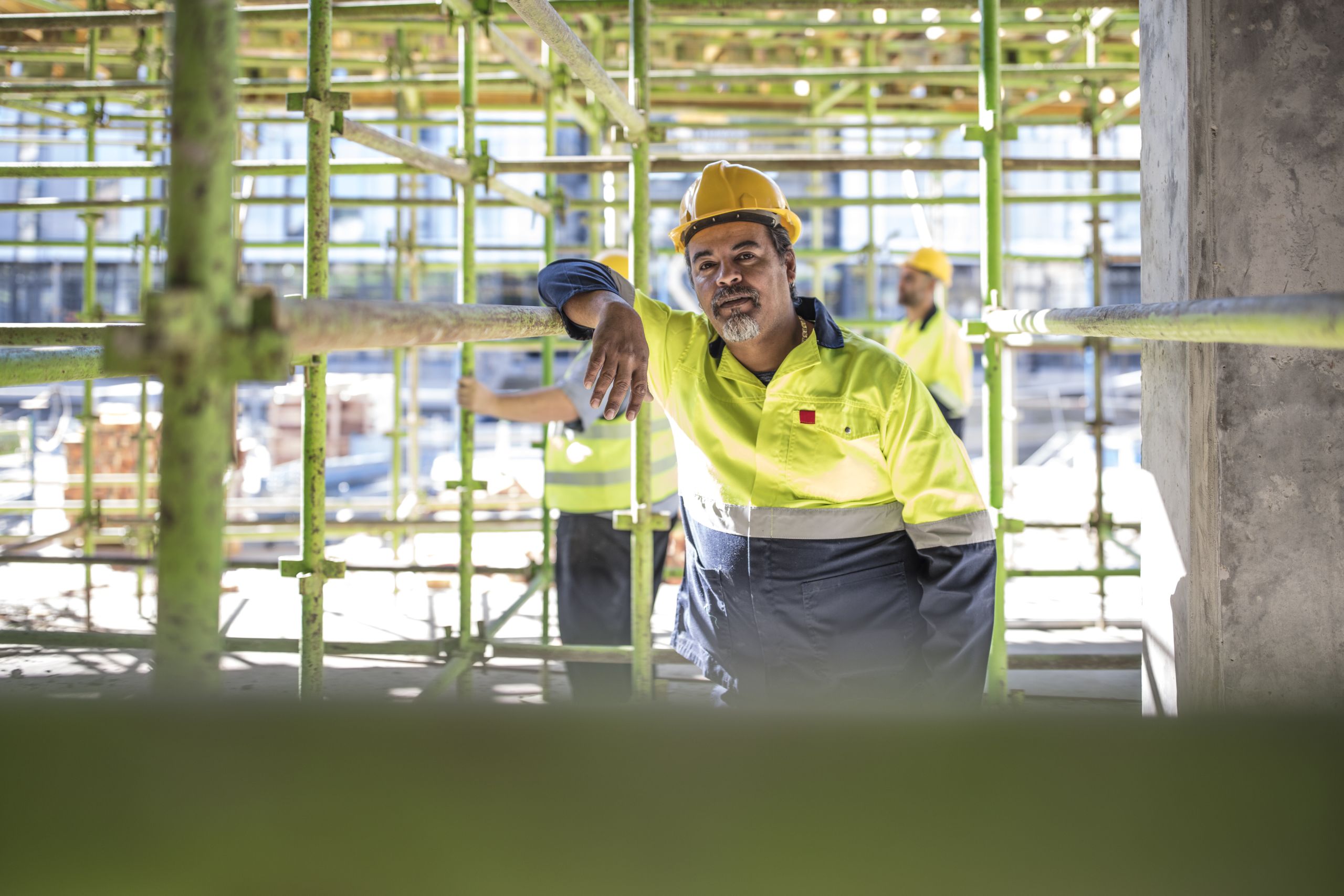 Construction workers on scaffolding